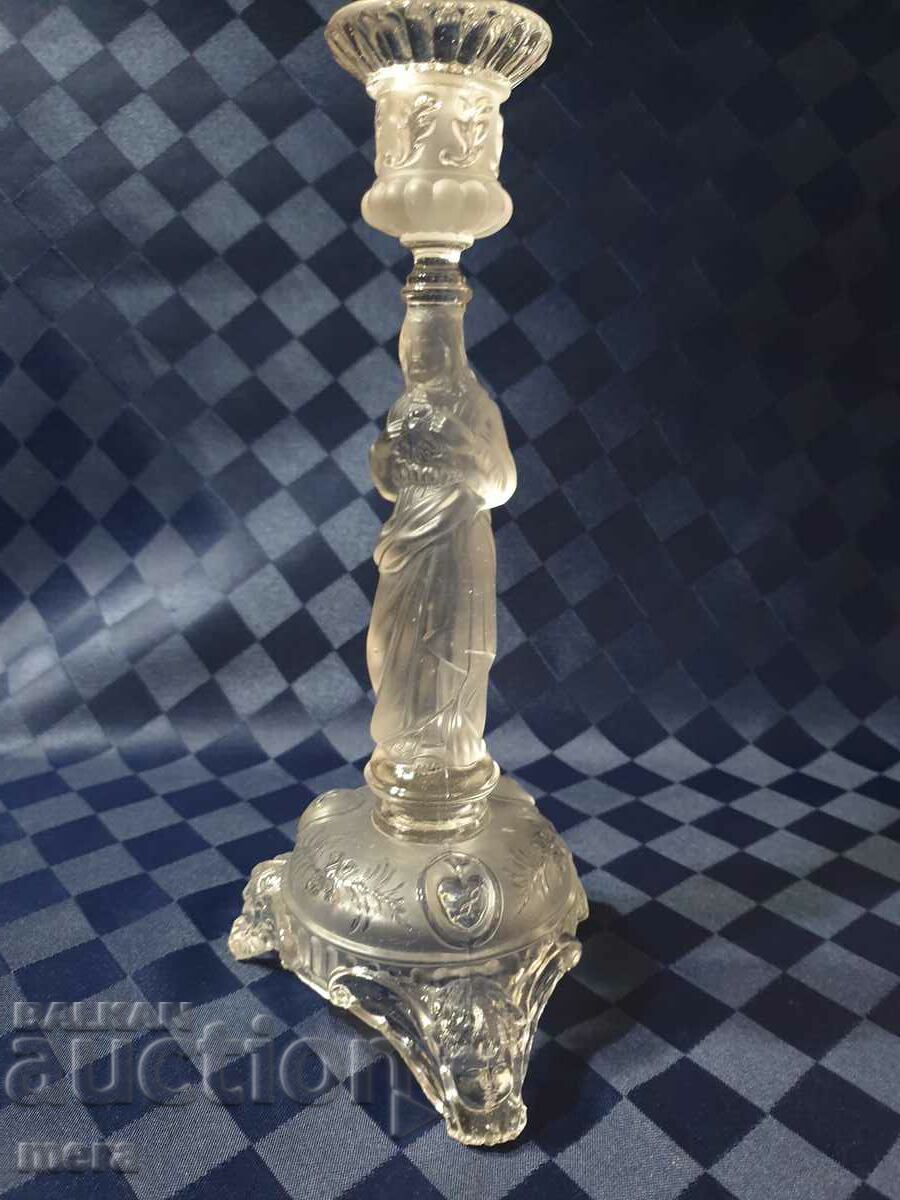 Crystal candlestick with religious motifs