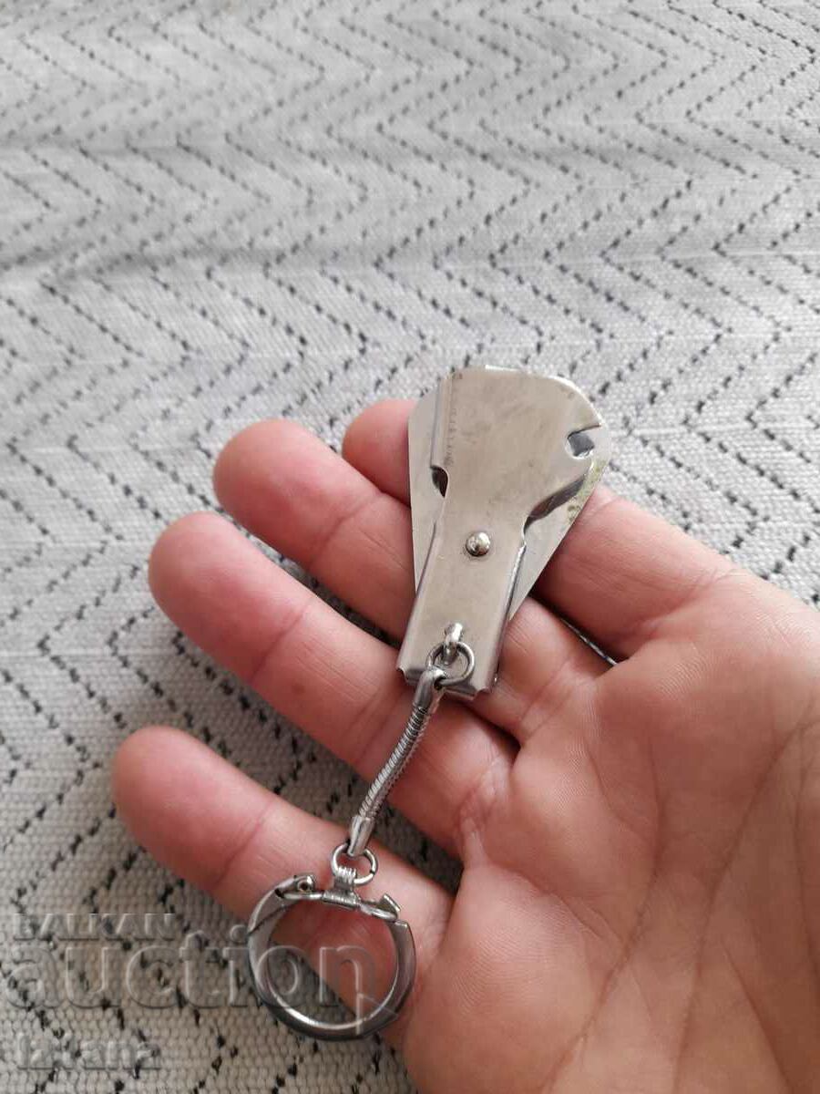 Auction Old key chain opener Auction Old key chain opener