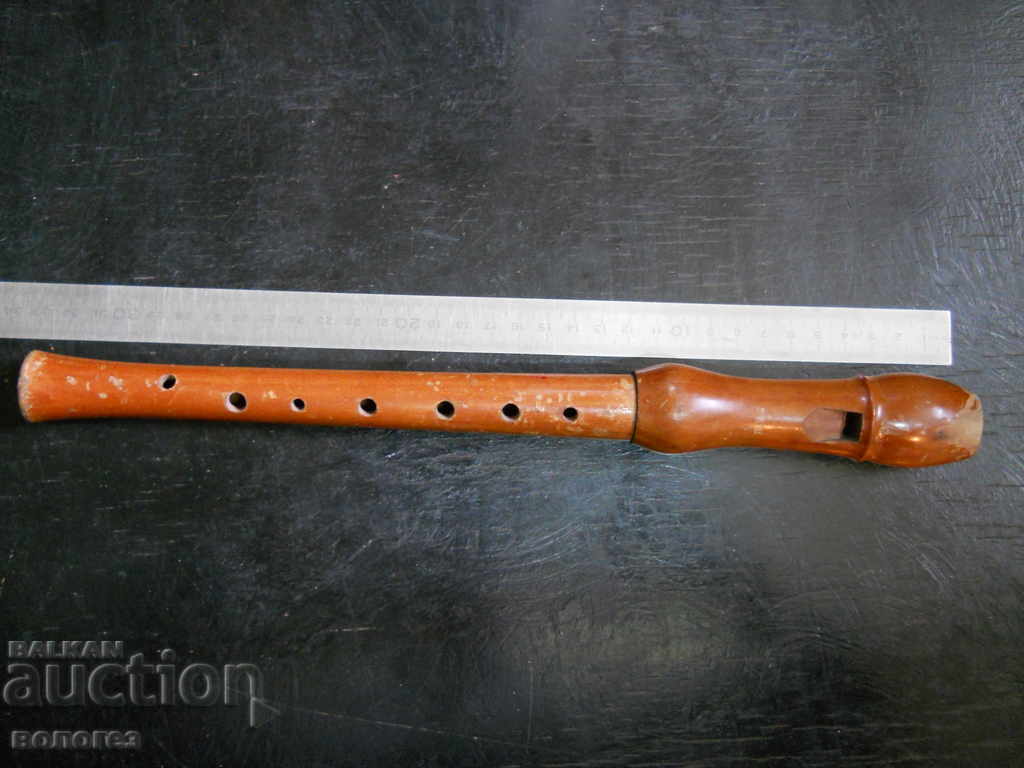 old wooden musical instrument - recorder