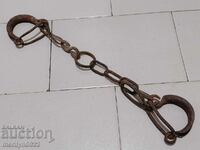 Old hand-forged buckles, chains, shackles, shackles