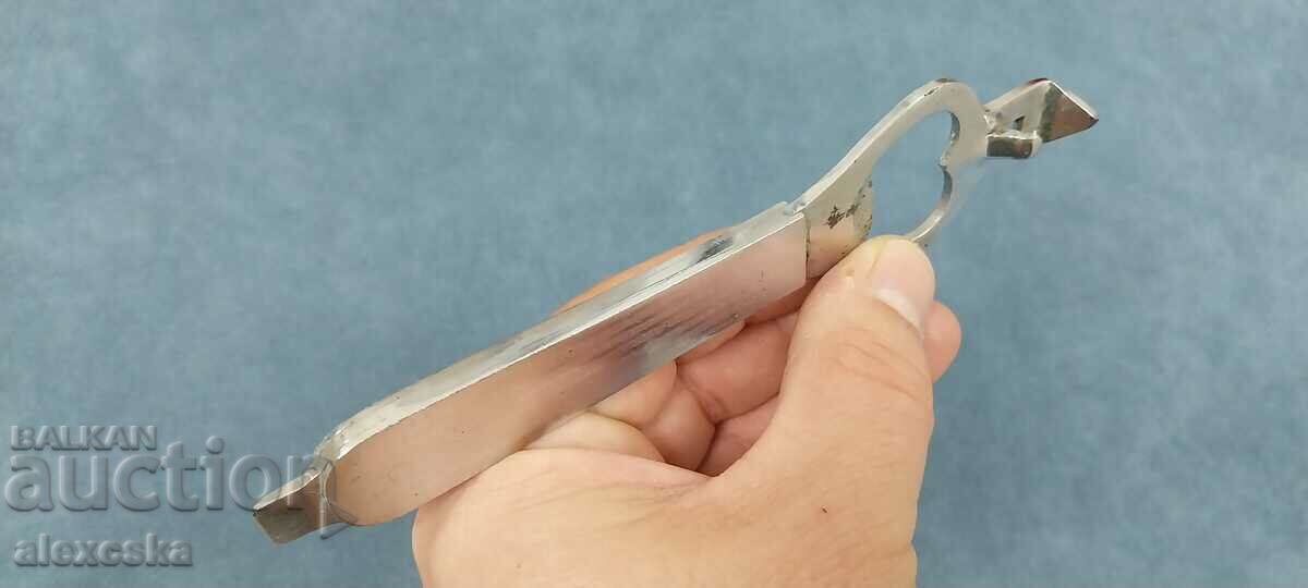 Παράδοση Παλιό ανοιχτήρι μπουκαλιών - "Heineken"