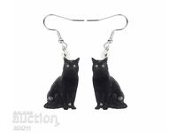 Μαύρα σκουλαρίκια γάτας, δύο μαύρα σκουλαρίκια γάτας