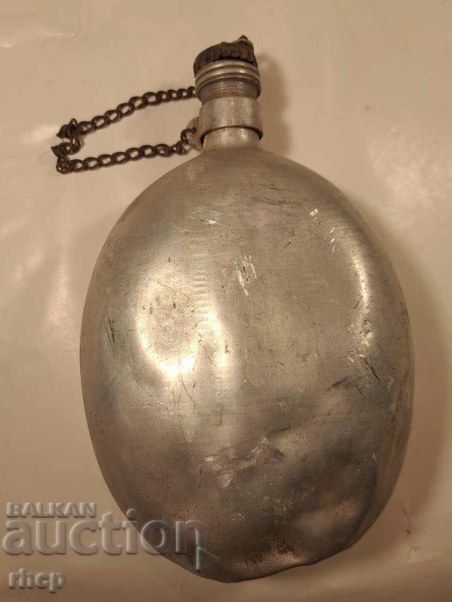 Old aluminum military canteen