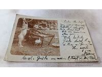 Picture A man and a naked little boy 1904