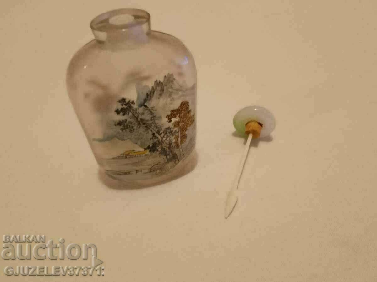 Chinese snuff bottle is made of glass, the inner one Chinese snuff bottle is made of glass, the inner one