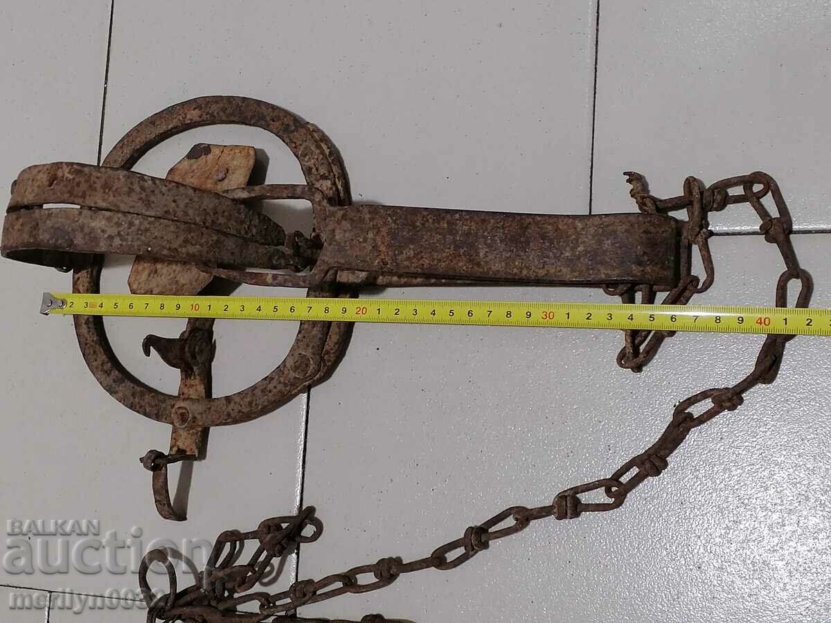 Auction Old hand forged trap with wrought iron spikes Auction Old hand forged trap with wrought iron spikes