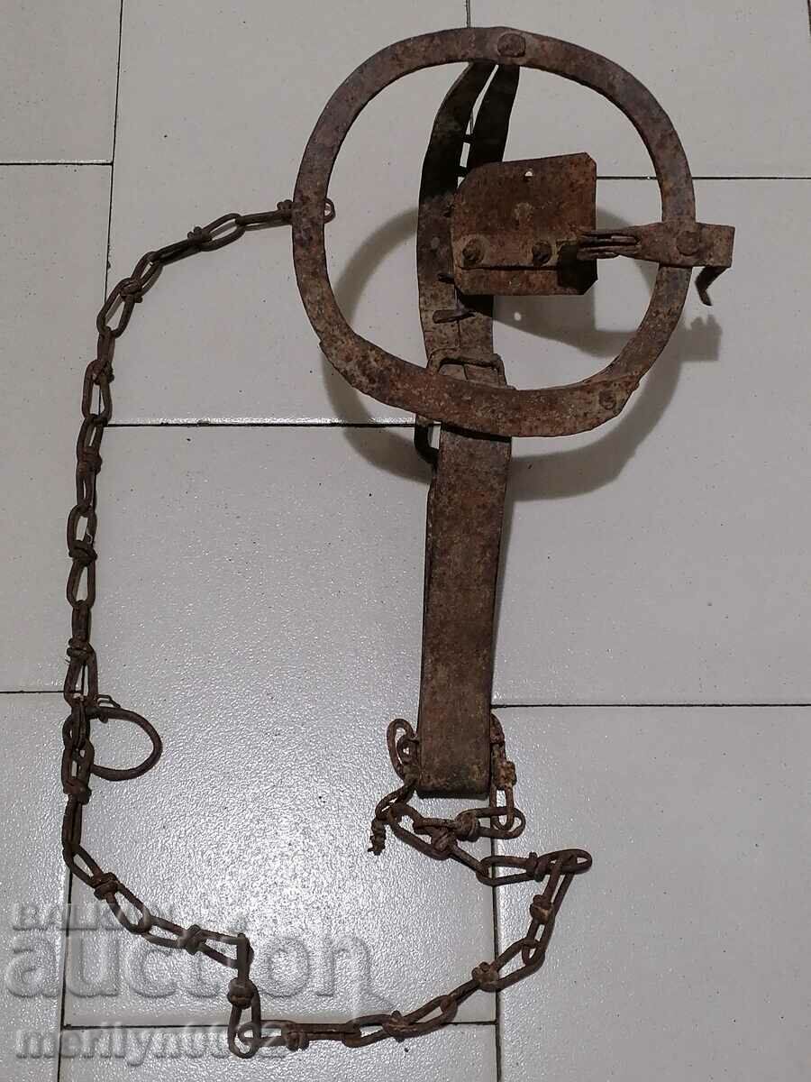 Delivery of Old hand forged trap with wrought iron spikes Delivery of Old hand forged trap with wrought iron spikes