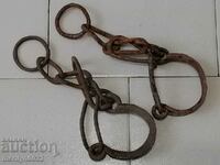Old hand-forged buckles, chains, shackles, shackles