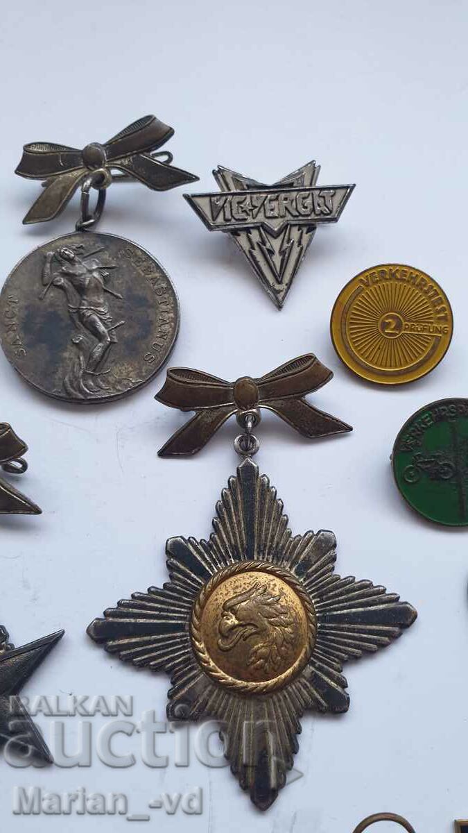 Lot of foreign medals and badges with price 50.00 BGN | € 25.56 Lot of foreign medals and badges with price 50.00 BGN | € 25.56