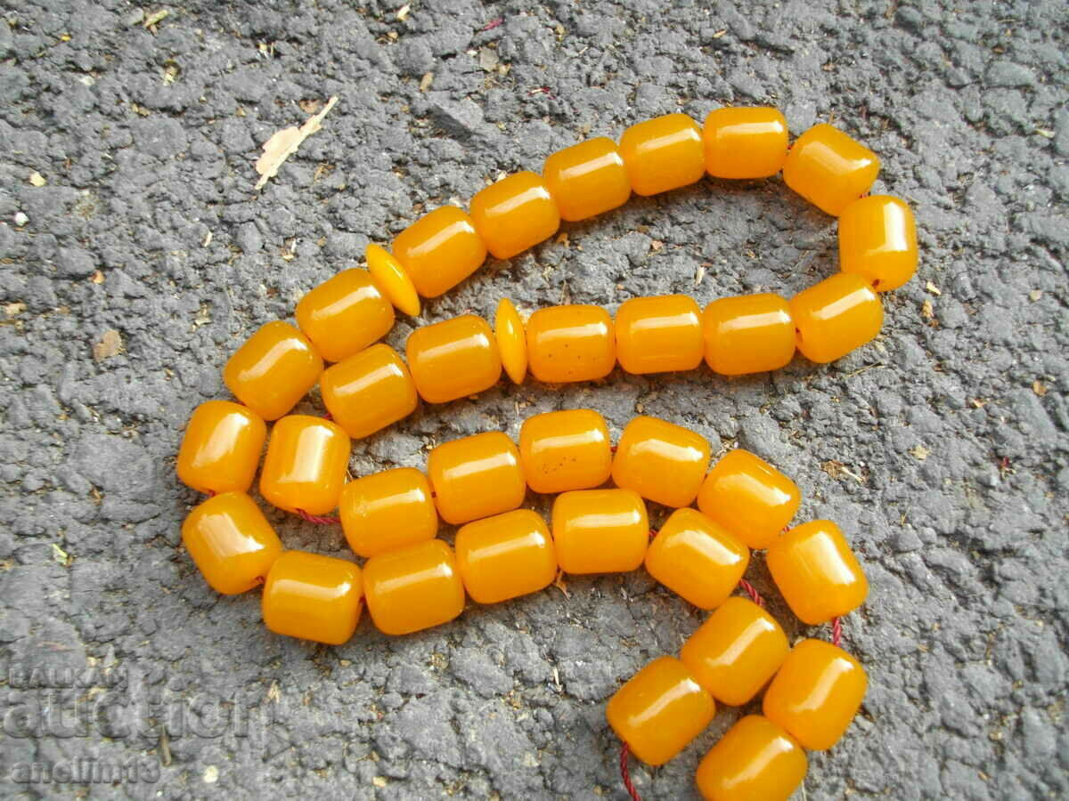 OLD BAKELITE AMBER CATALINE ROSARY WITH SILVER TASSEL with price 450.00 BGN | € 230.08