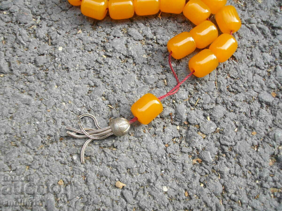 Auction  OLD BAKELITE AMBER CATALINE ROSARY WITH SILVER TASSEL