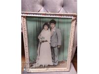 Foto veche culoare mare cu rama proaspăt căsătoriți