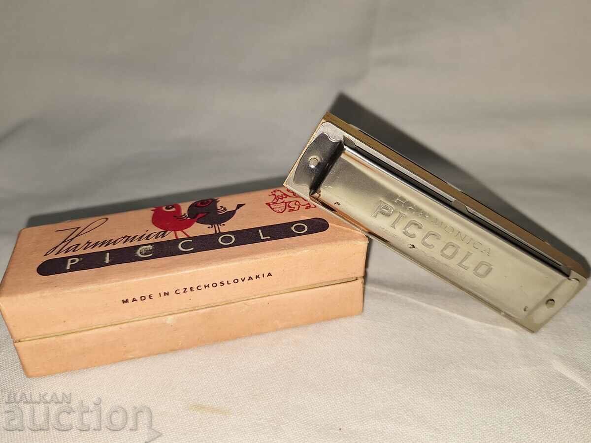 Veche armonică--Piccolo--Cehoslovacia cu preț 30.00 BGN | € 15.34 Veche armonică--Piccolo--Cehoslovacia cu preț 30.00 BGN | € 15.34