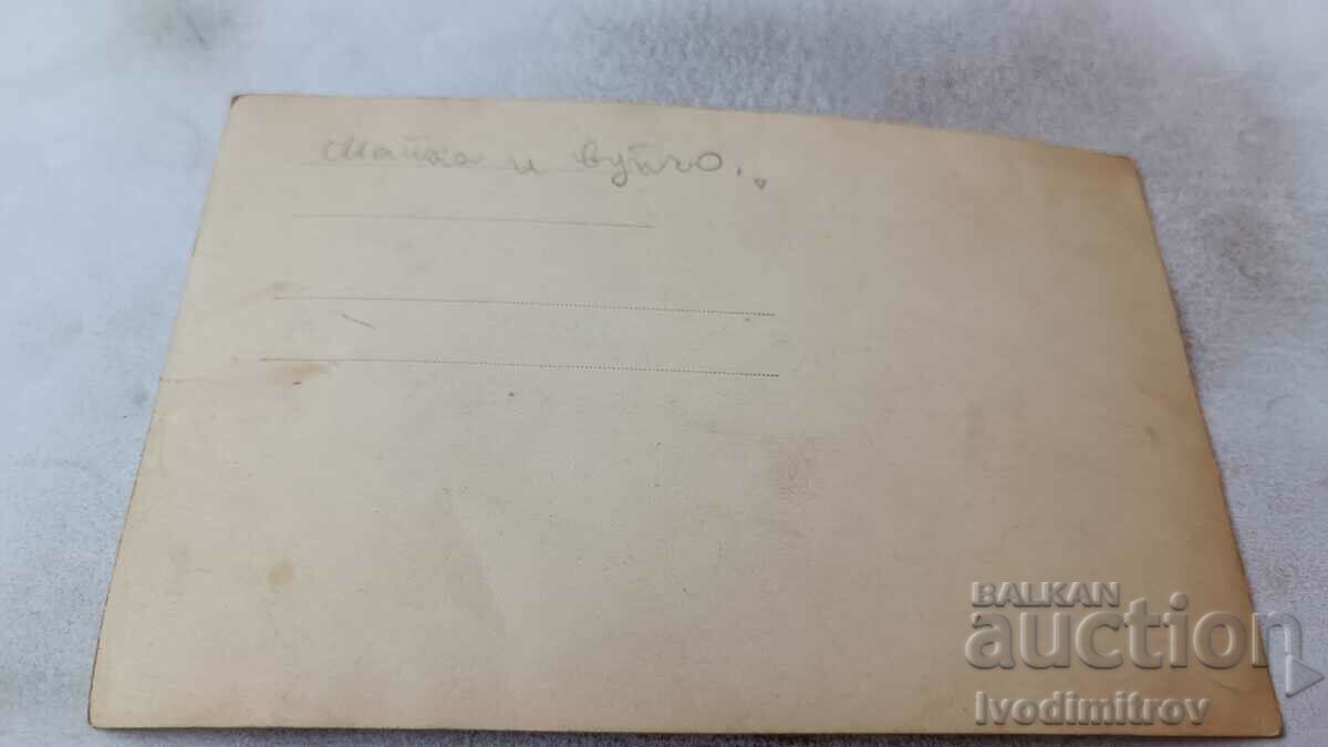 Photo A young man and a young girl in a vintage swimsuit in the sea with price 2.85 BGN | € 1.46 Photo A young man and a young girl in a vintage swimsuit in the sea with price 2.85 BGN | € 1.46