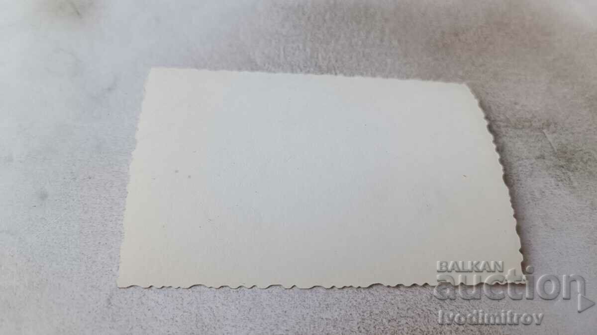 Photo Two women in front of a royal plane with price 1.85 BGN | € 0.95 Photo Two women in front of a royal plane with price 1.85 BGN | € 0.95