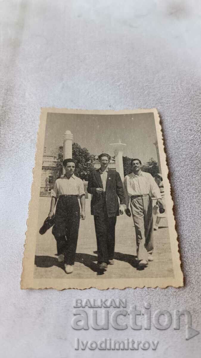 Photo Varna Three young men at the entrance to the Sea Garden