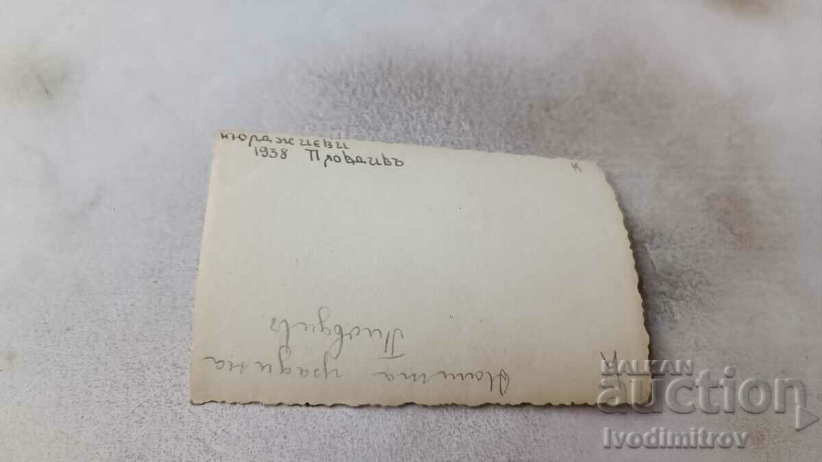 Photo Plovdiv Woman in the yard of a house 1938 with price 1.15 BGN | € 0.59 Photo Plovdiv Woman in the yard of a house 1938 with price 1.15 BGN | € 0.59