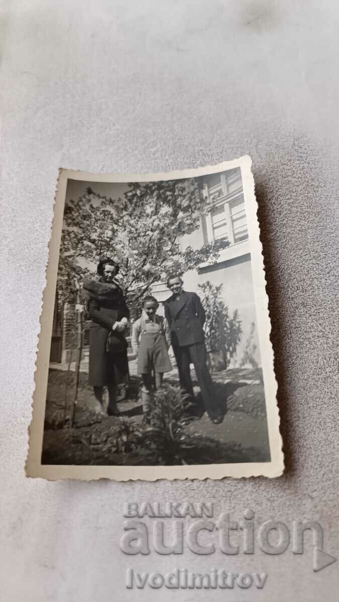 Photo Plovdiv Woman and two boys in the yard of a house 1938