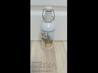 Collectible beer bottle with porcelain stopper