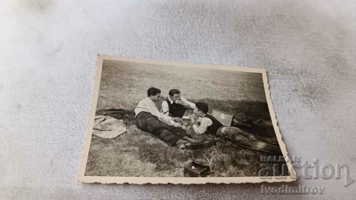 Photo Bankya Lyulinu Three young men lay down on the meadow 1940