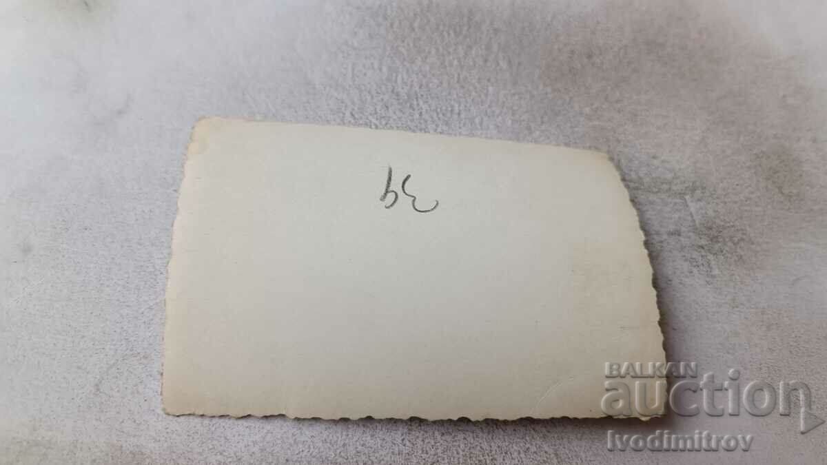 Photo Two men sitting on a wooden bench with price 1.15 BGN | € 0.59 Photo Two men sitting on a wooden bench with price 1.15 BGN | € 0.59