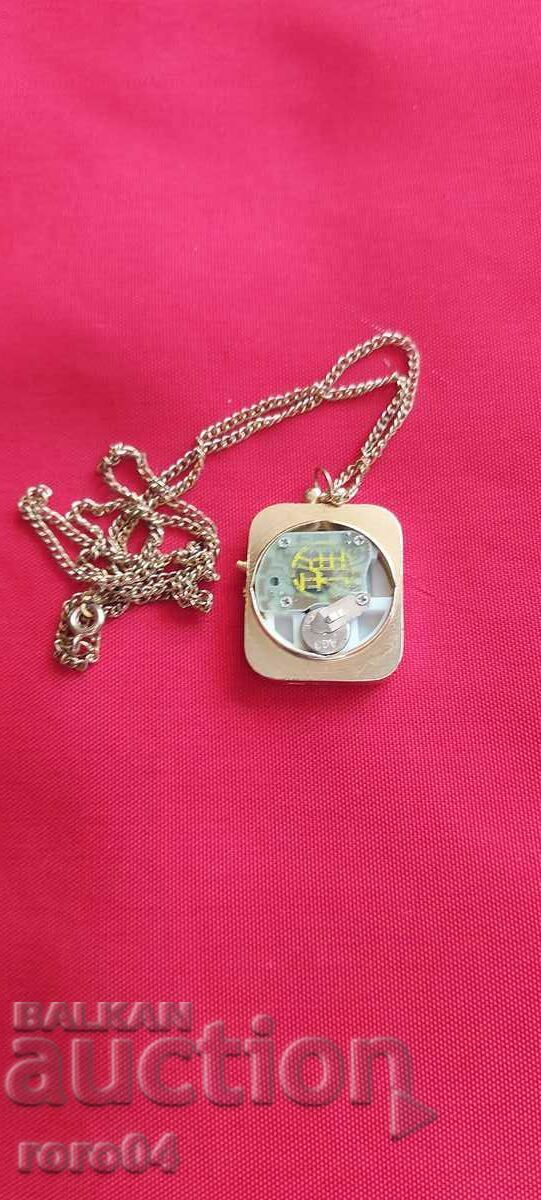 Auction  ELECTRONIC WATCH - MEDALLION - WORKING