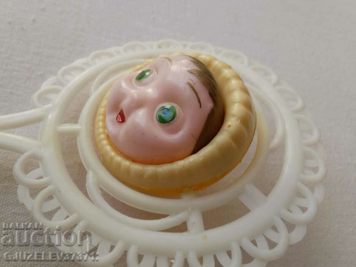 Delivery of Retro old baby toy Bakelite rattle Delivery of Retro old baby toy Bakelite rattle