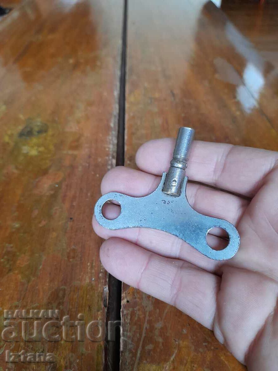 Auction Old winding key Auction Old winding key