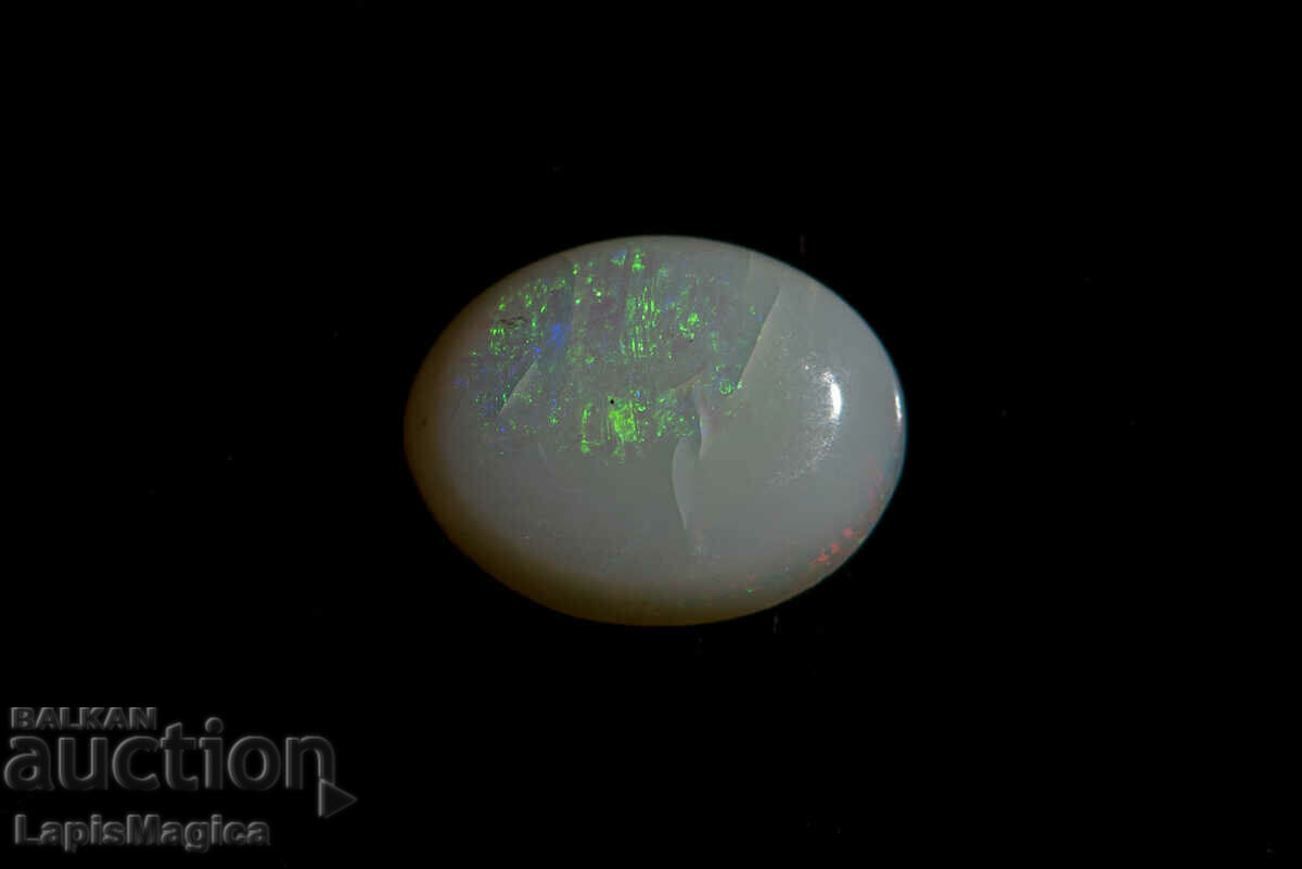 Auction Australian Crystal Opal 1.30ct Oval Cabochon Auction Australian Crystal Opal 1.30ct Oval Cabochon