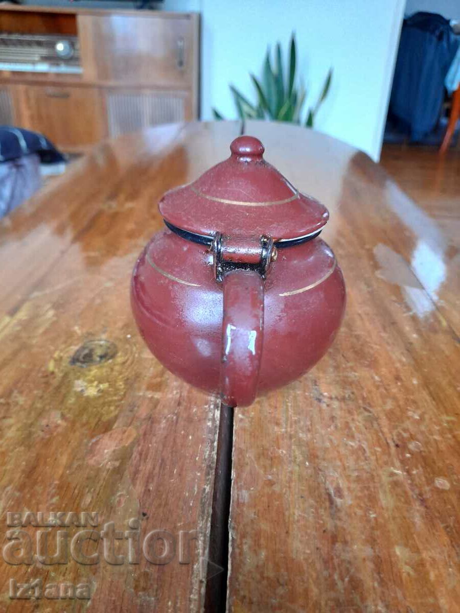 Delivery of Old enamel teapot