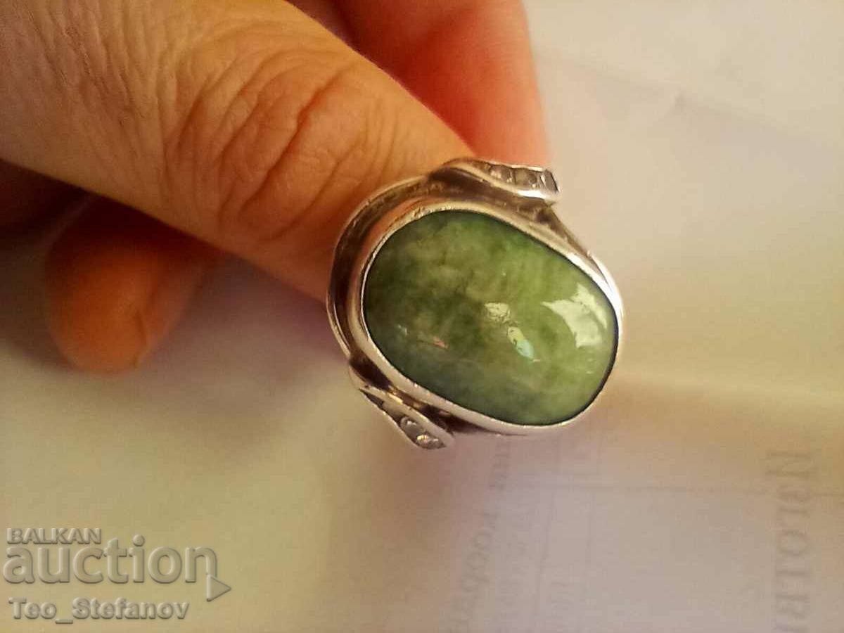 Large silver ring with jade and zircons