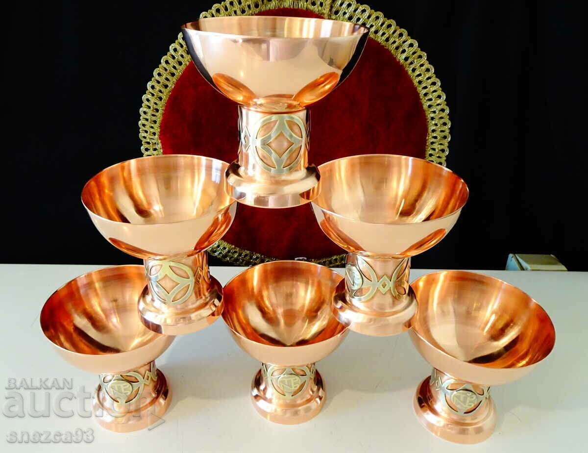 A gorgeous copper set of wine and champagne glasses. A gorgeous copper set of wine and champagne glasses.