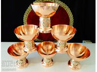 A gorgeous copper set of wine and champagne glasses.