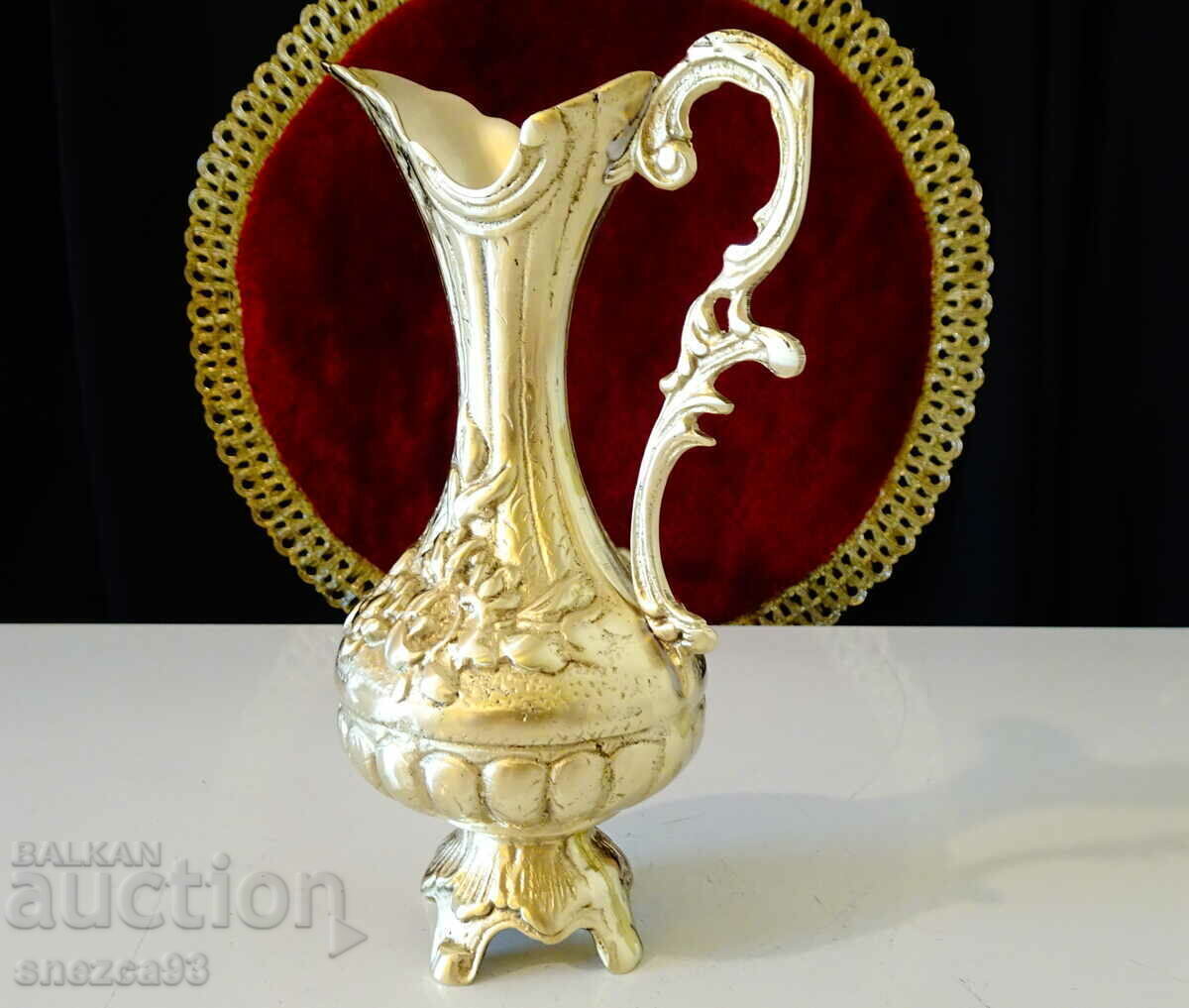 Auction Bronze jug, roses, baroque. Auction Bronze jug, roses, baroque.