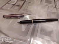 Black pen with a metal cap