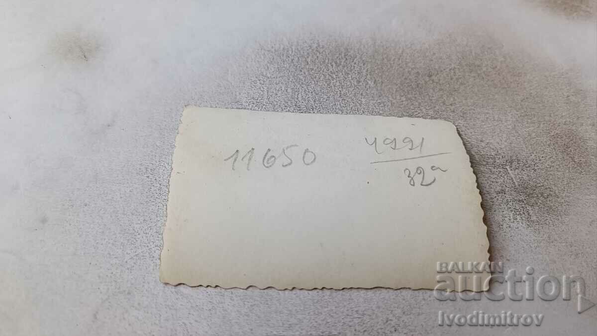 Photo Sofia Two men in winter coats on a walk with price 2.45 BGN | € 1.25 Photo Sofia Two men in winter coats on a walk with price 2.45 BGN | € 1.25