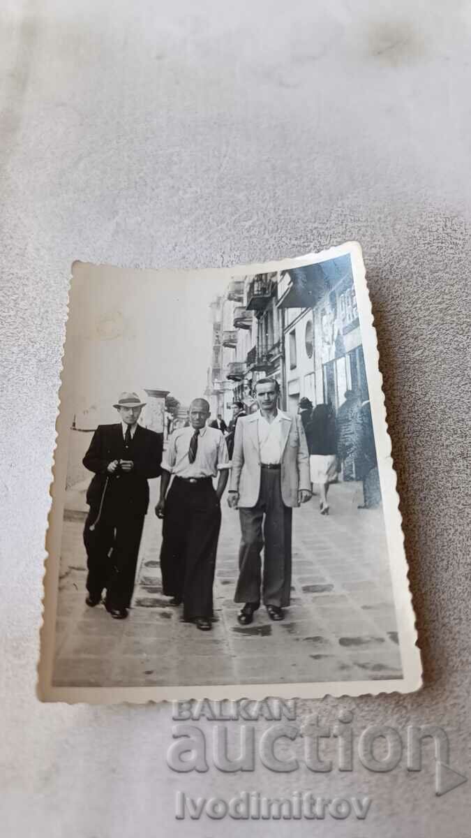 Photo Sofia Three men on the sidewalk