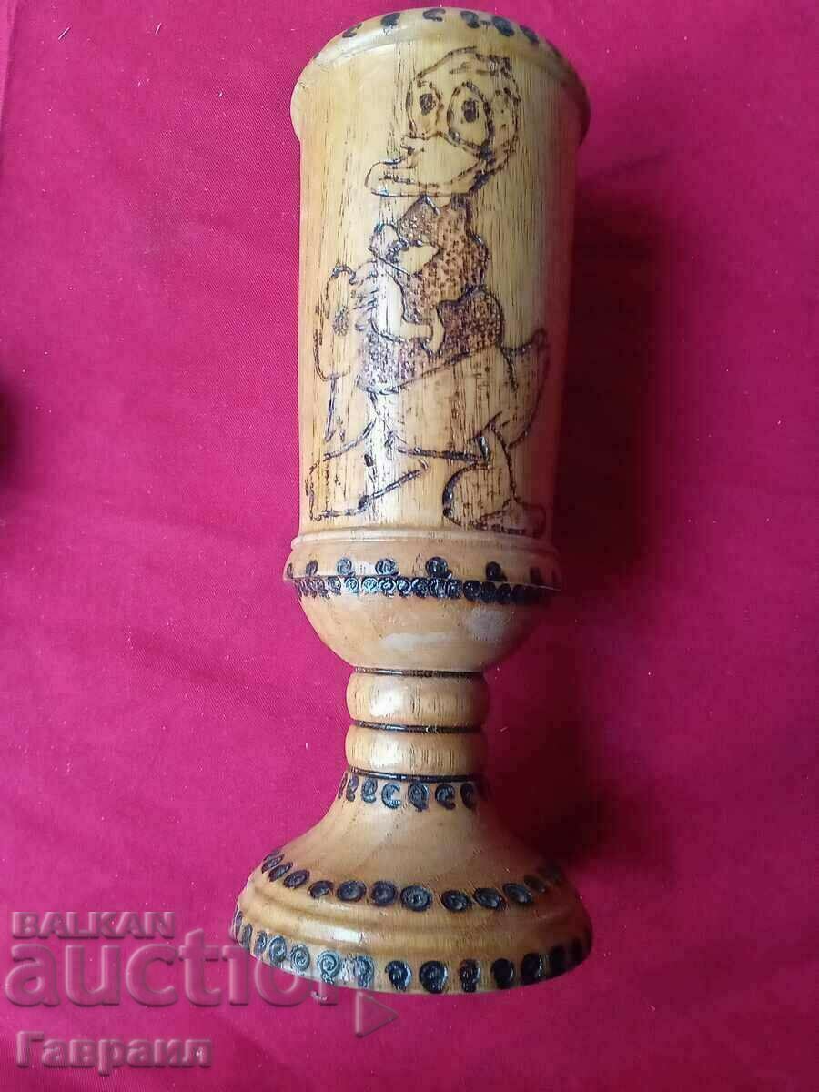 A wooden vase with price 5.00 BGN | € 2.56 A wooden vase with price 5.00 BGN | € 2.56