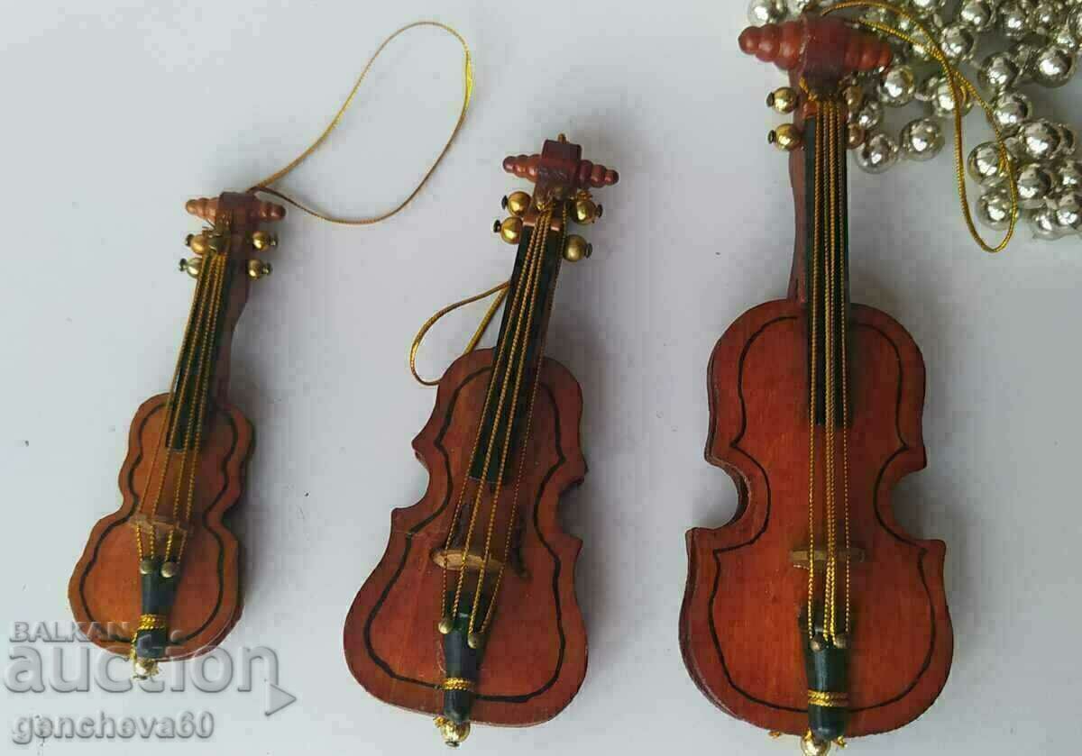 Lot of small wooden violins for decoration with price € 12.00 | 23.47 BGN Lot of small wooden violins for decoration with price € 12.00 | 23.47 BGN