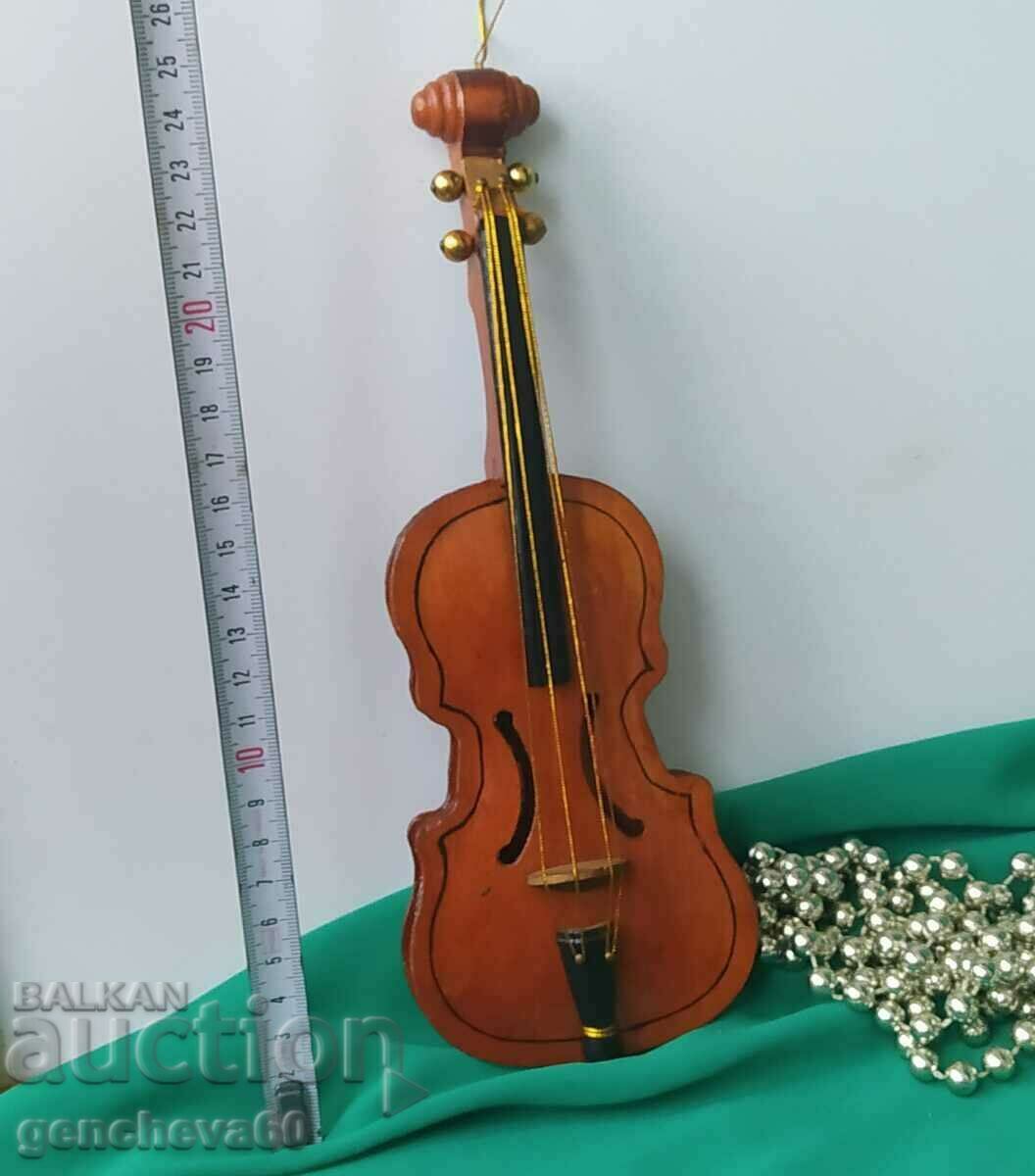 Wooden musical instrument - violin for decoration
