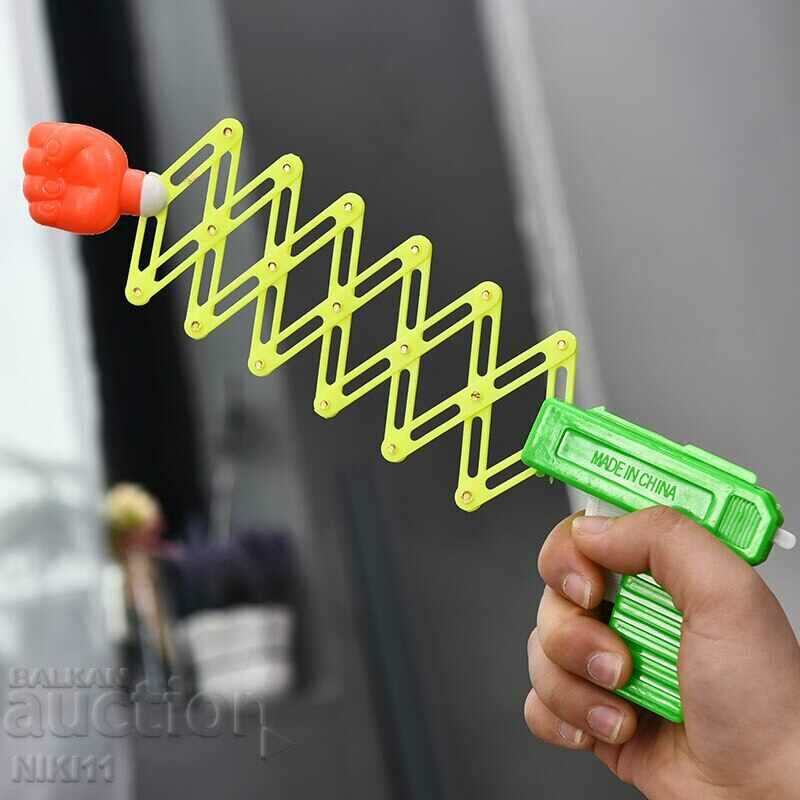 Toy gun with punching bag