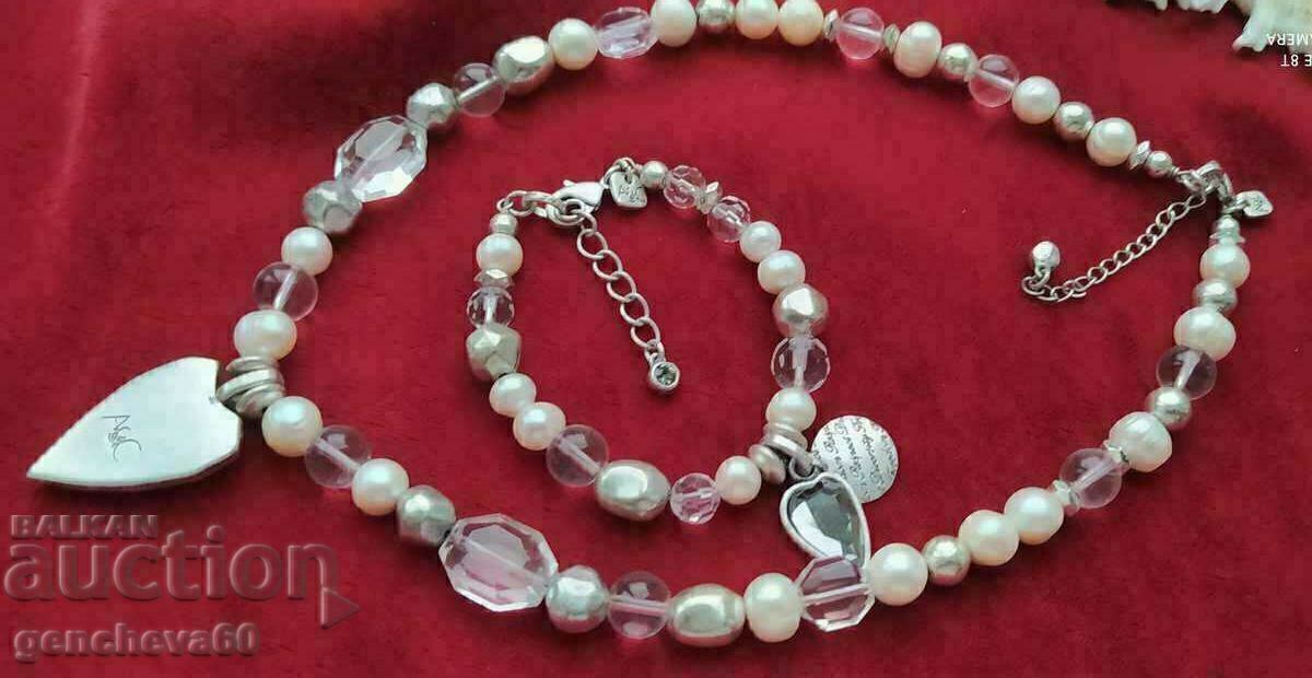 Delivery of Designer set of pearls, hearts, crystals, tags Delivery of Designer set of pearls, hearts, crystals, tags