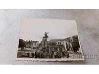 Photo Karlovo Men, women and children in front of the monument to V. Levski