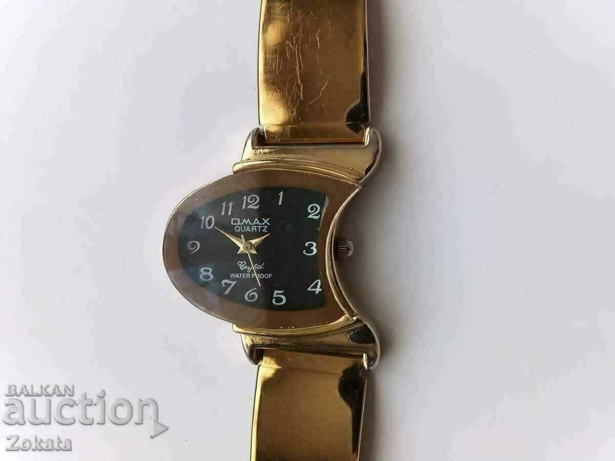 OMAX Japanese quartz watch. OMAX Japanese quartz watch.