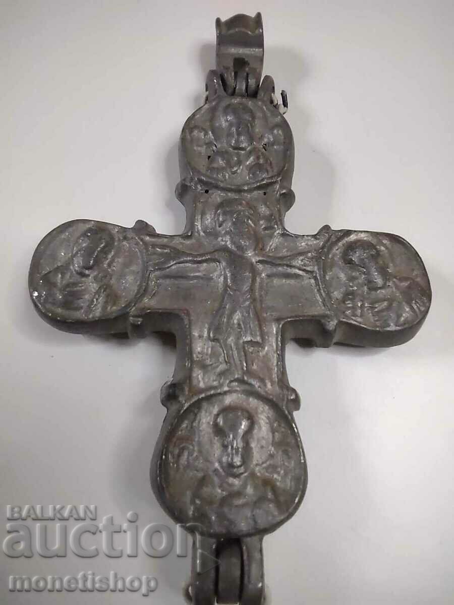 A very old model of an antique cross