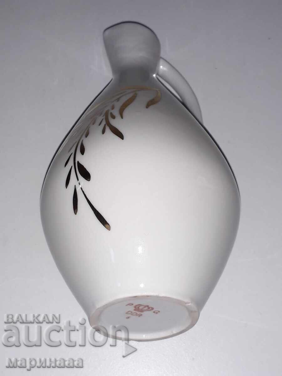 Livrarea KANA. RDG. PORCELAN, AUR