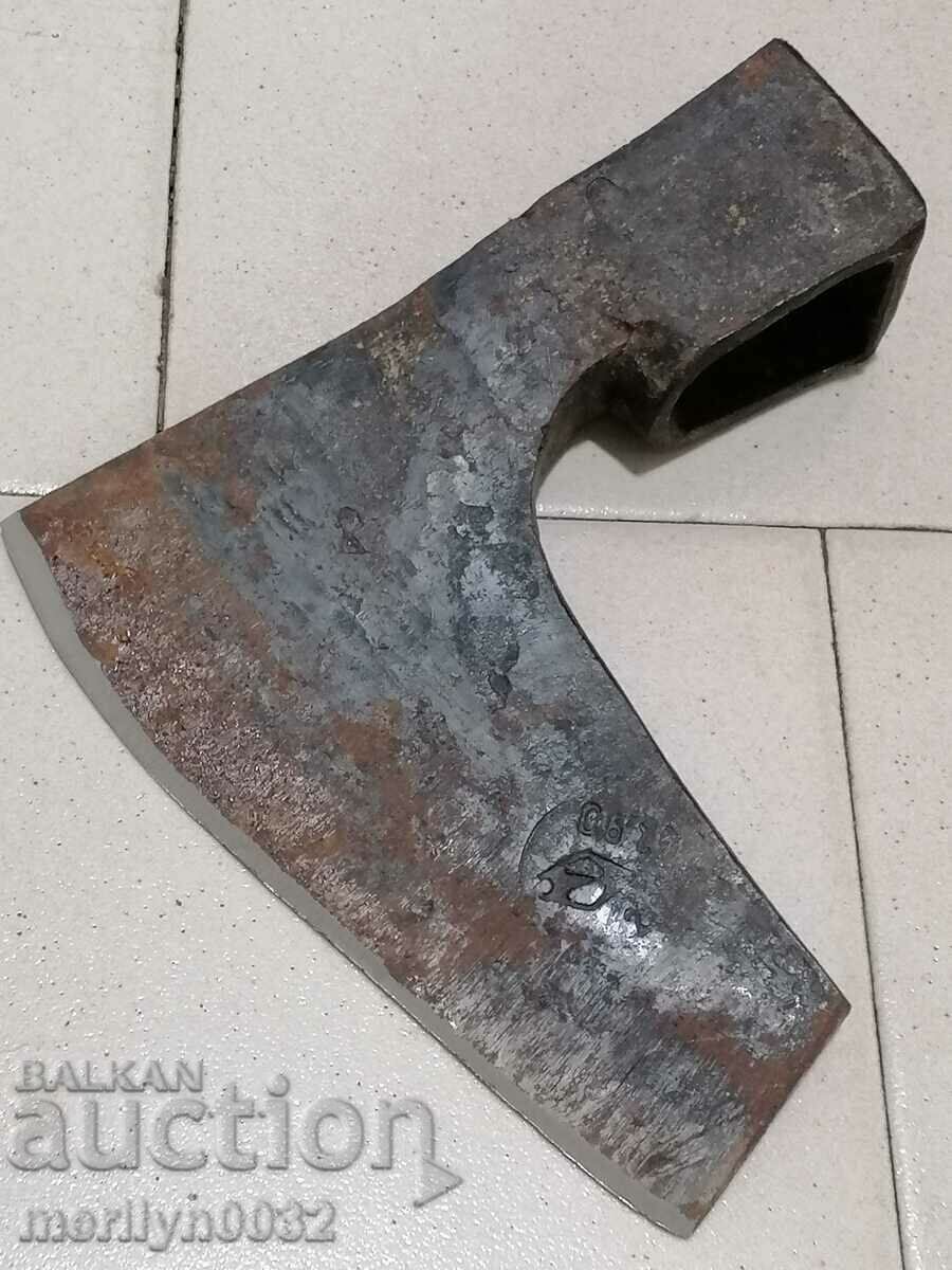 Old forged soc ax without a handle with a satyr ax stamp