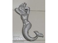 Mermaid figure embossed aluminum social period bas-relief