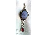 Large silver locket with sapphire and ruby