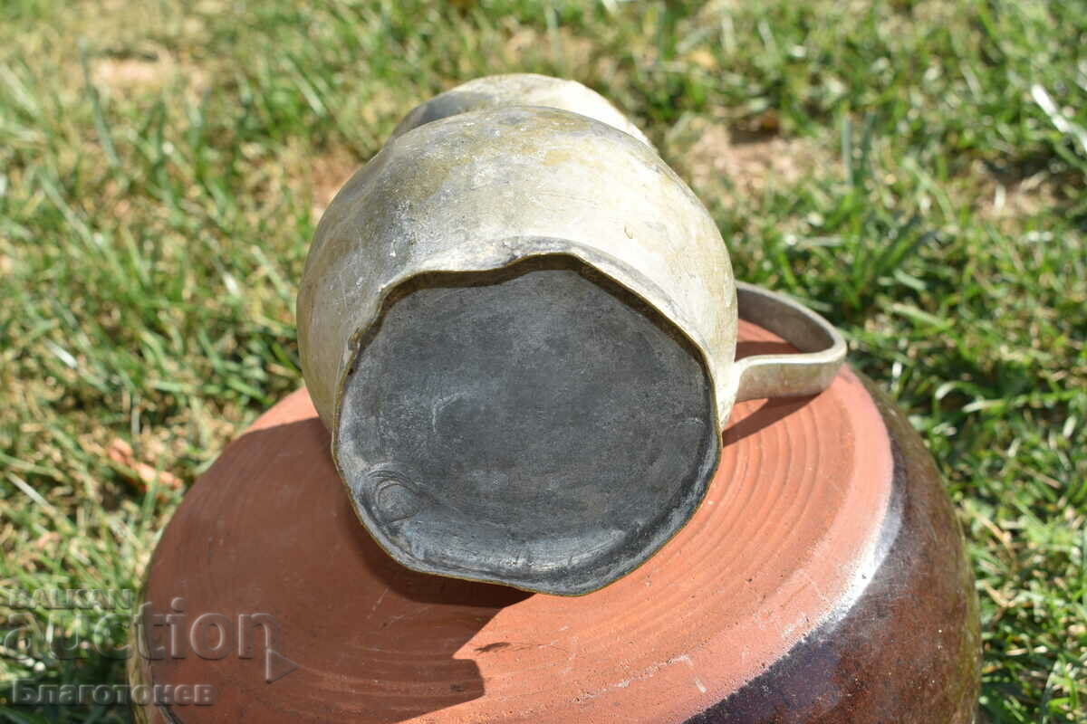 Auction Old wrought copper jug Auction Old wrought copper jug